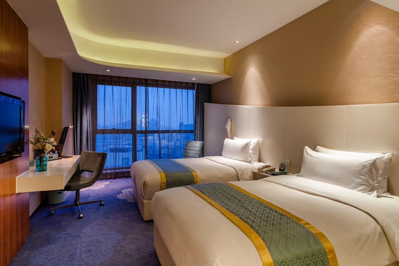 Hangzhou E M Grand Hotel מראה חיצוני תמונה